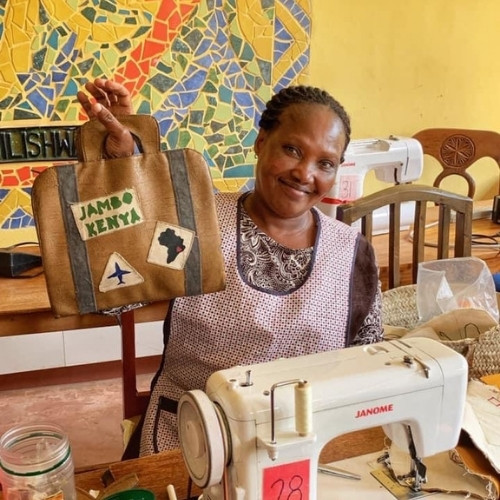 Kenyan woman creating fair trade products | Fair Trade Store | Our Impact | Take Heart Africa